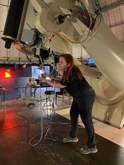 Dr. Aarnio and telescope